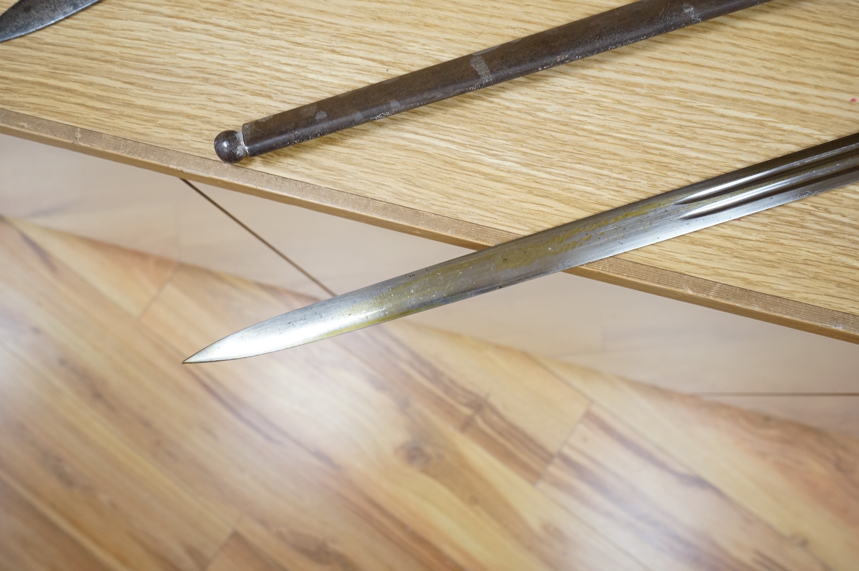 World War I Scottish infantry officer’s undress sword, etched and polished regulation blade with crowned GVR cipher and regulation cruciform hilt, in its steel scabbard